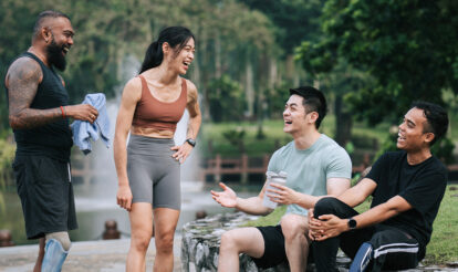 Group of people exercising, socialising and enjoying each other's presence
